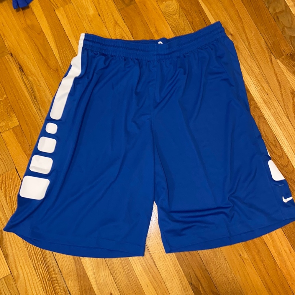 Blue Nike athletic shorts